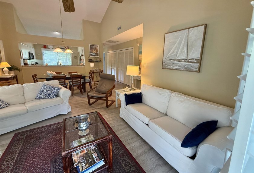 Updated and attractive second-floor end-unit villa featuring two - photo 18