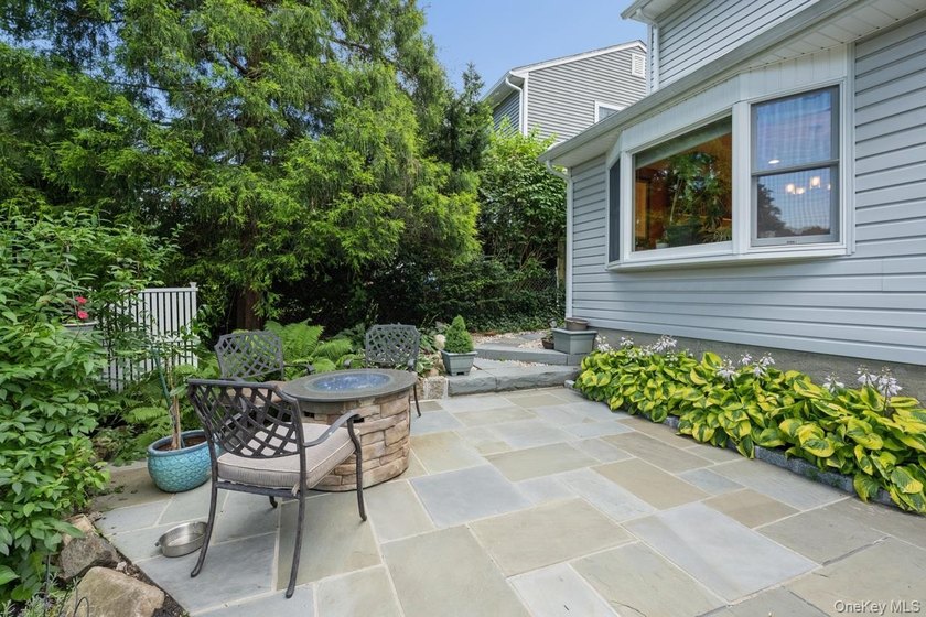 The brick driveway and lovely porch welcome you to this turnkey - photo 29