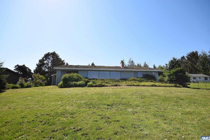 Rare, stunning waterfront property ready for your remodel - photo 29
