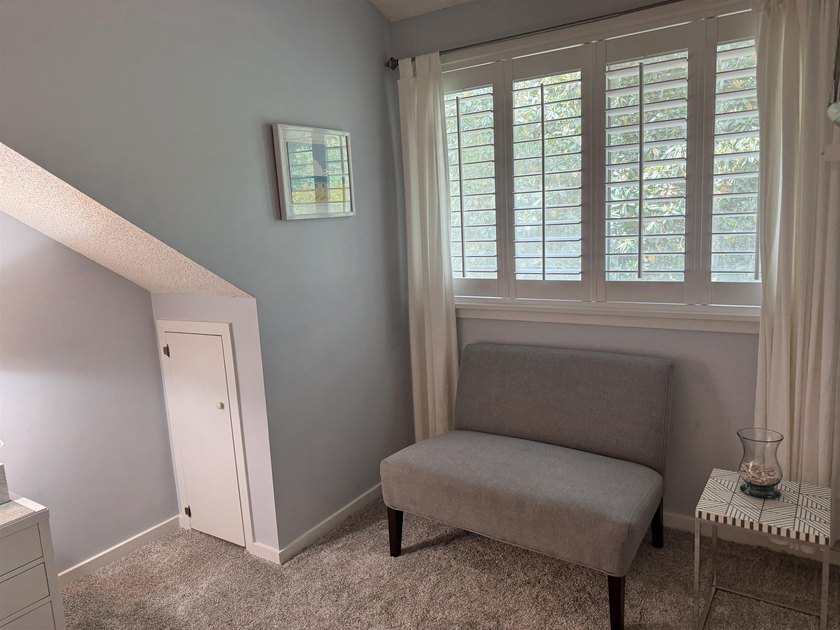 Updated and attractive second-floor end-unit villa featuring two - photo 31