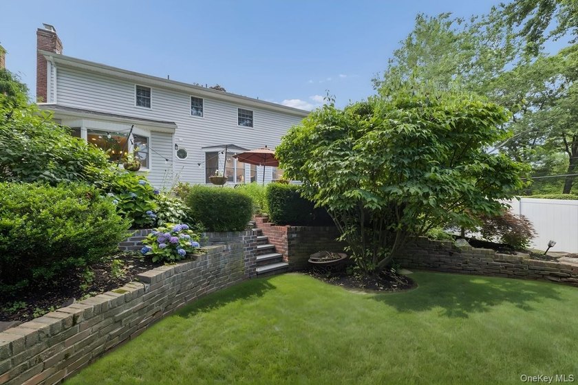 The brick driveway and lovely porch welcome you to this turnkey - photo 31