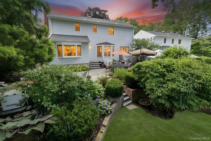 The brick driveway and lovely porch welcome you to this turnkey - photo 33