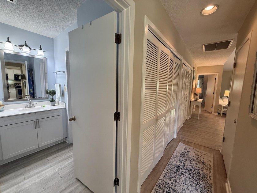 Updated and attractive second-floor end-unit villa featuring two - photo 38