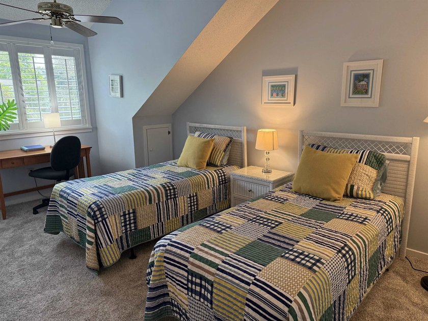 Updated and attractive second-floor end-unit villa featuring two - photo 42