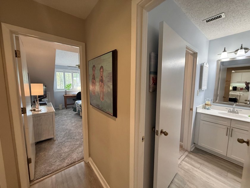 Updated and attractive second-floor end-unit villa featuring two - photo 44