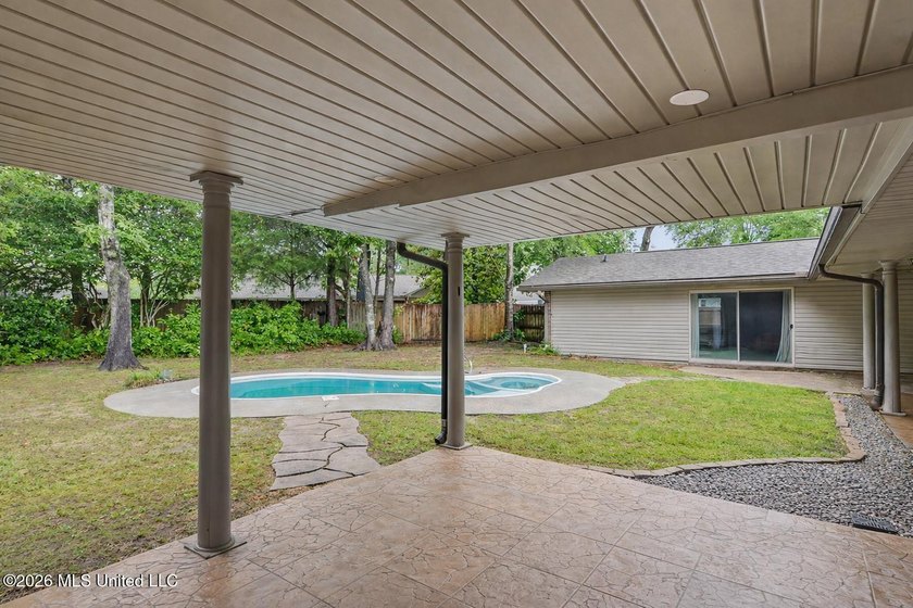 Situated on a quiet cul-de-sac in the heart of Diamondhead, this - photo 23