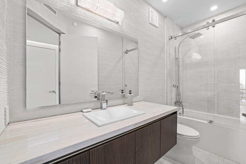 A truly rare offering in Boca Raton, this exquisitely reimagined - photo 24