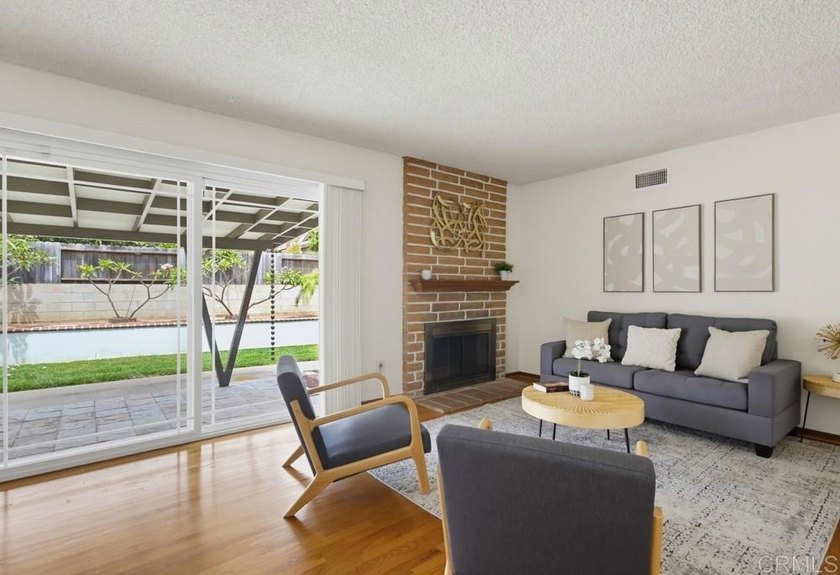 Welcome to this beautifully maintained Serra Mesa home where the - photo 2