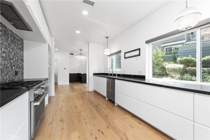 Welcome to this luxurious *Club View* townhouse nestled in an - photo 17