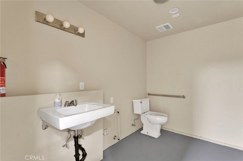 A truly rare mixed-use commercial opportunity offering the - photo 43