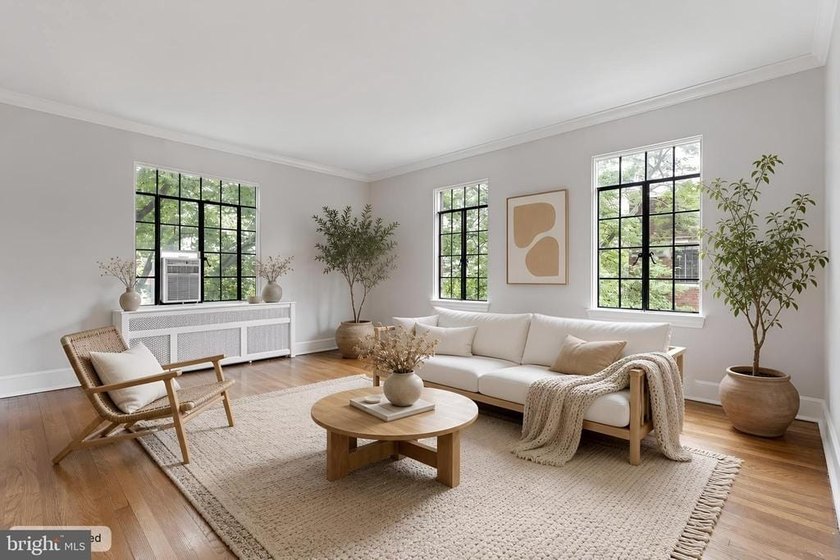 This corner unit is located on the top floor of the historic - photo 3