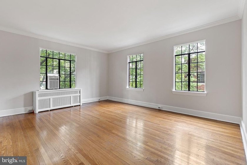 This corner unit is located on the top floor of the historic - photo 4