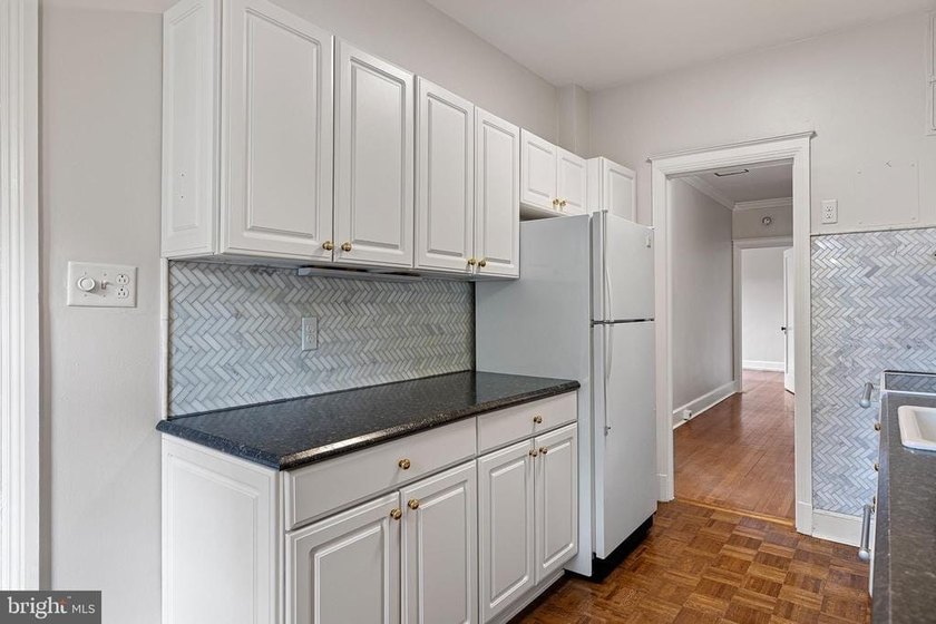 This corner unit is located on the top floor of the historic - photo 10