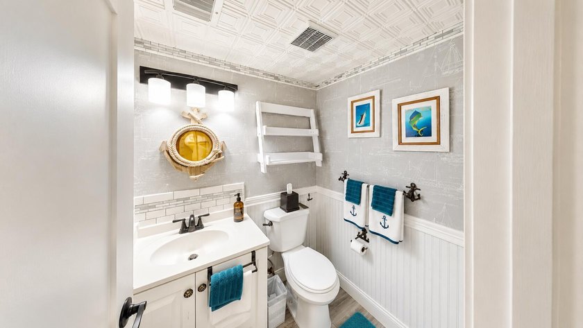 Waterfront living awaits in this beautifully maintained - photo 13