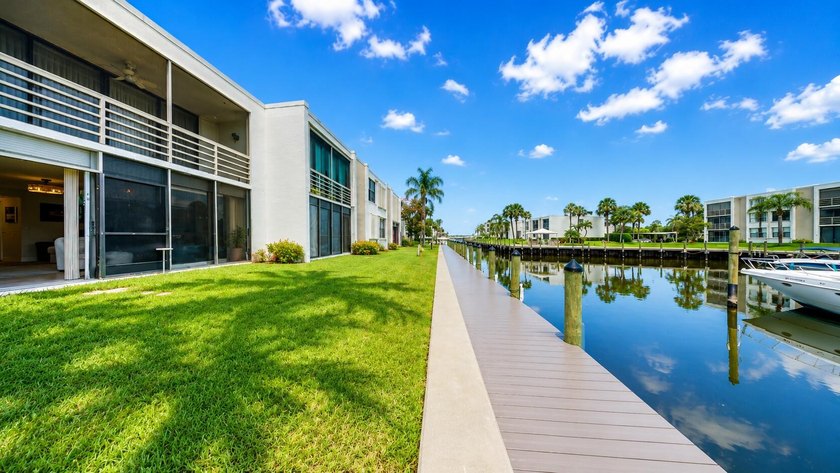 Waterfront living awaits in this beautifully maintained - photo 16