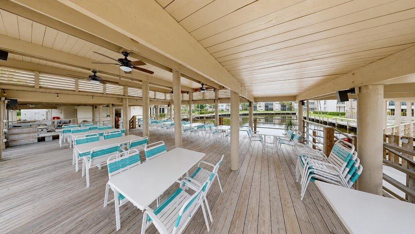 Waterfront living awaits in this beautifully maintained - photo 22