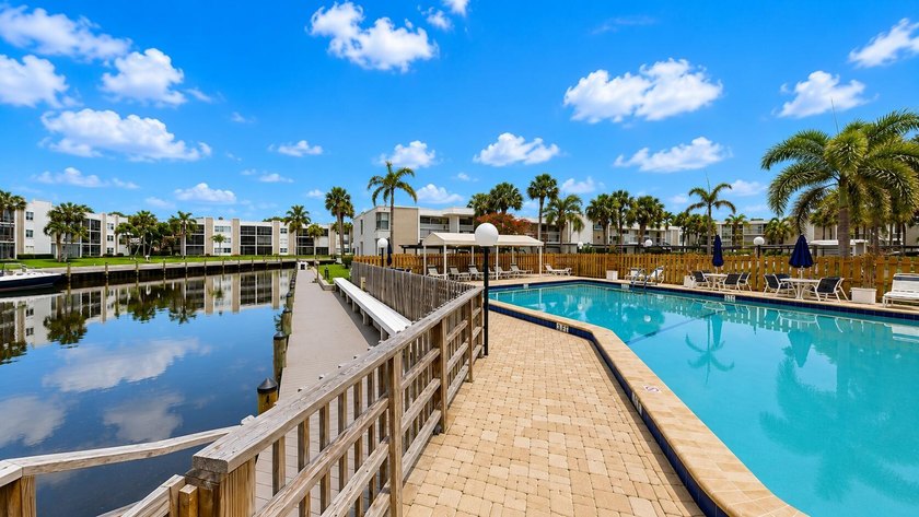 Waterfront living awaits in this beautifully maintained - photo 23