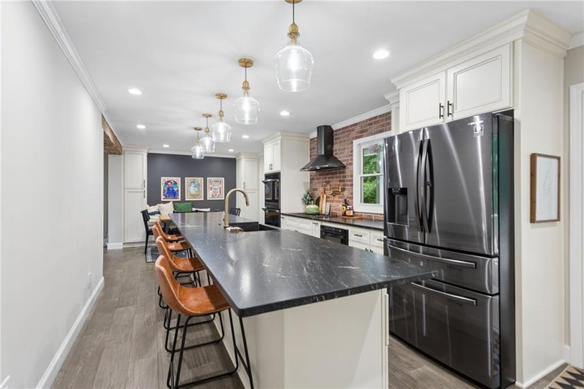 Experience luxury living in the highly sought-after Indian Hills - photo 3