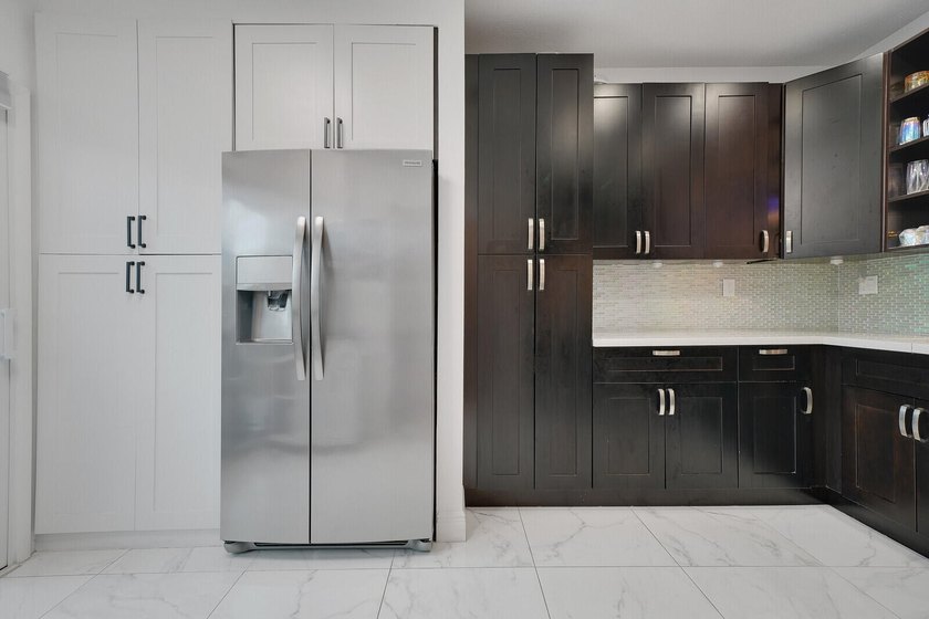 Welcome to this beautifully maintained two-story townhouse in - photo 12