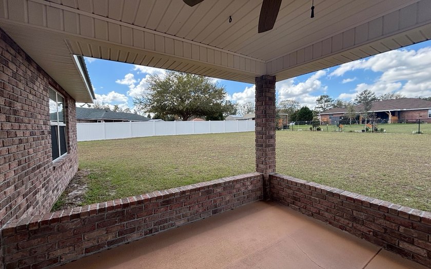 Move in ready, Beautiful brick home on large lot with new vinyl - photo 25