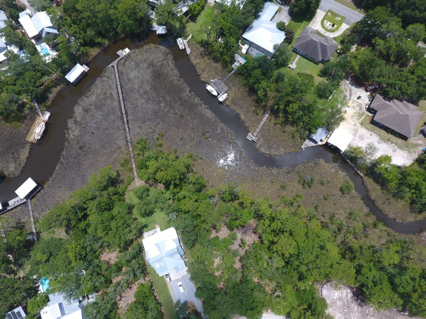 Welcome home to Lot 2 Dog Hobble Lane where old Florida serenity - photo 7