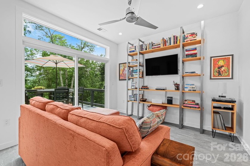 Mountain serenity meets modern comfort in this exceptional - photo 19