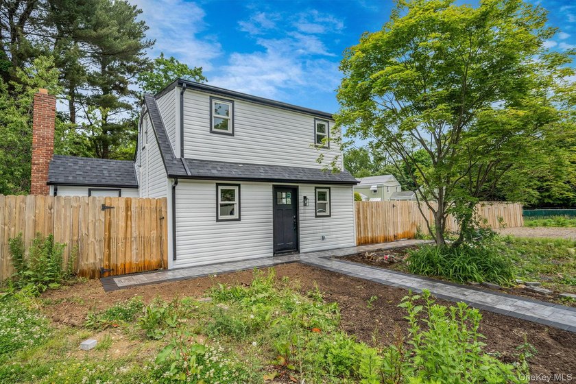 Turnkey Renovated Farmhouse-Style Cape - Elwood School District - photo 2