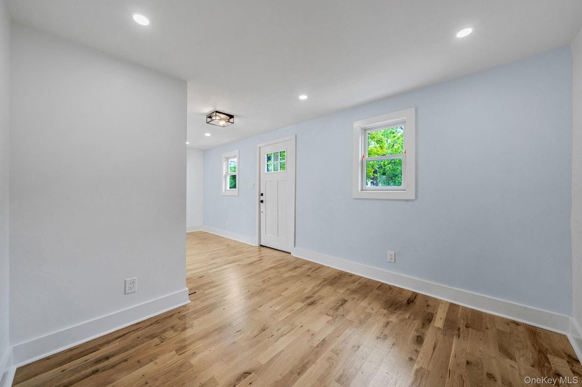 Turnkey Renovated Farmhouse-Style Cape - Elwood School District - photo 5