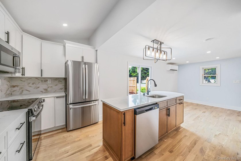Turnkey Renovated Farmhouse-Style Cape - Elwood School District - photo 10