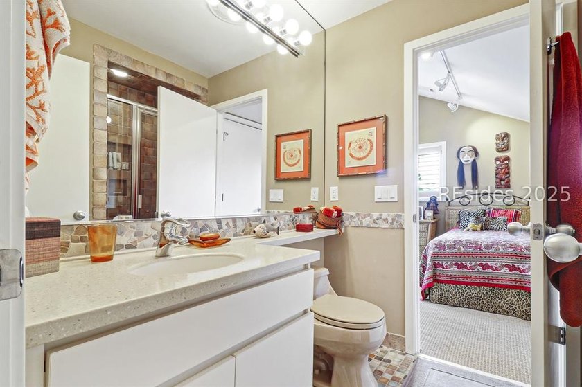 This sophisticated Marsh Island turn-key home offers a perfect - photo 36