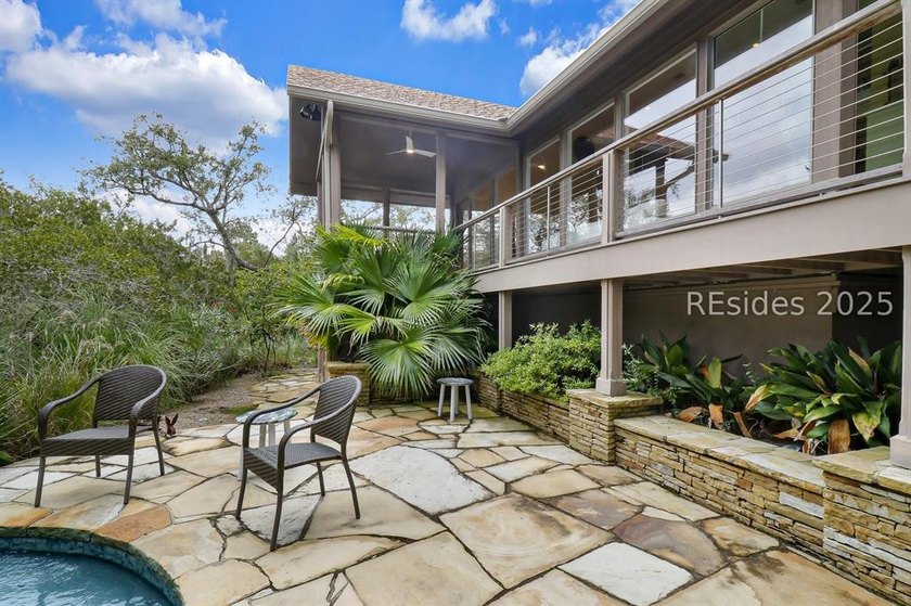 This sophisticated Marsh Island turn-key home offers a perfect - photo 46