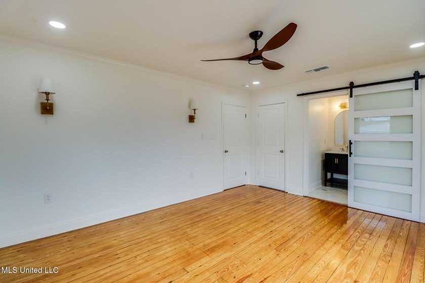 Taken down to the studs and completely rebuilt, this home offers - photo 11