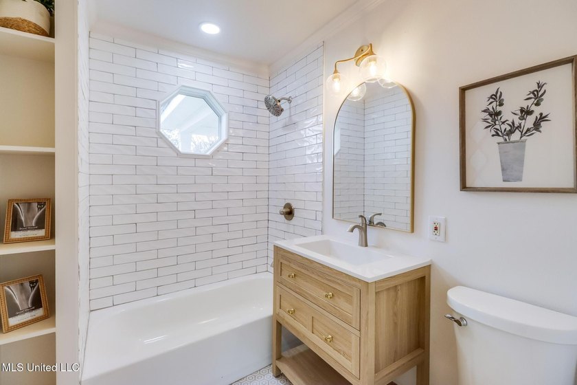 Taken down to the studs and completely rebuilt, this home offers - photo 16