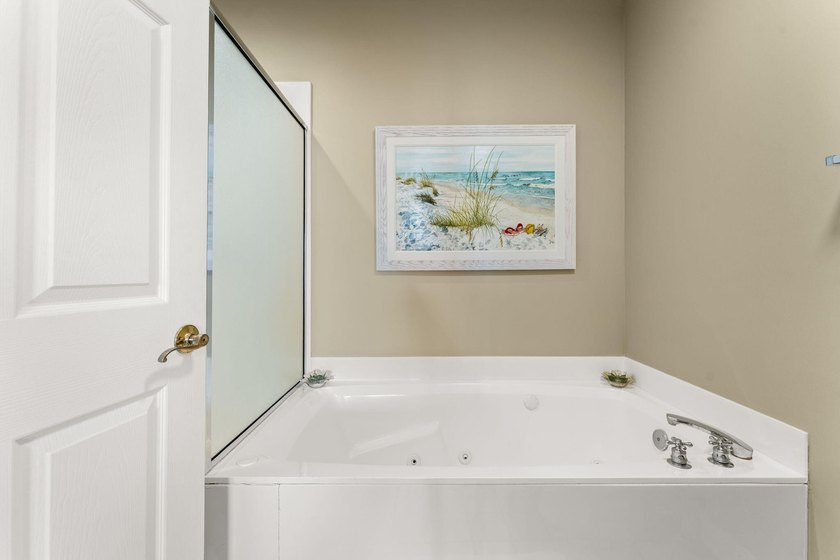 This never-rented residence offers rare dual perspectives with - photo 22