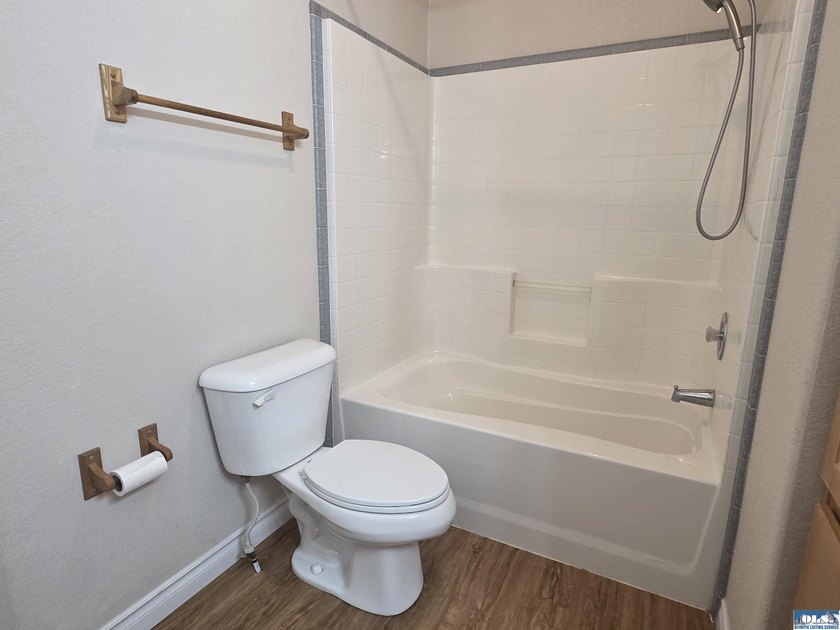 Space and natural light abound in this beautifully maintained - photo 23