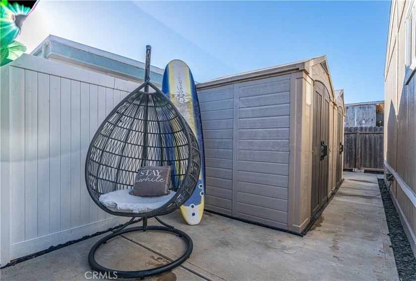 Boasting a rare, extra-large yard with a great grass area, this - photo 24