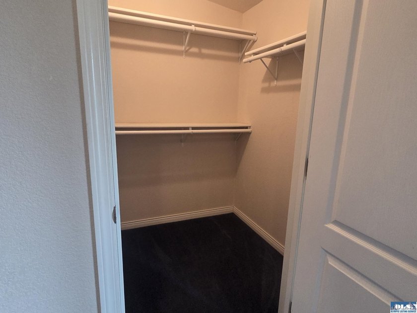Space and natural light abound in this beautifully maintained - photo 27
