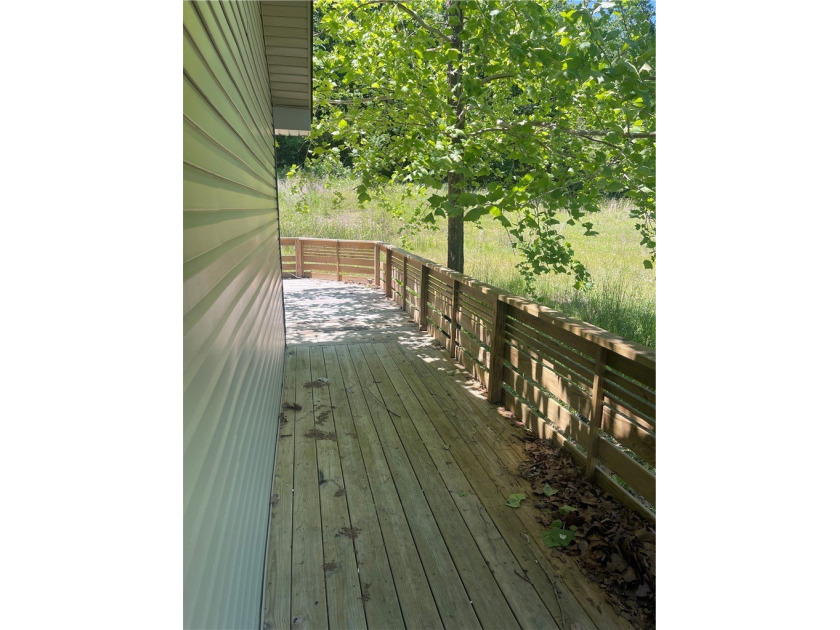 Charming 3-Bedroom home on 3 Acres - Lake Sequoyah Area! Nestled - photo 9