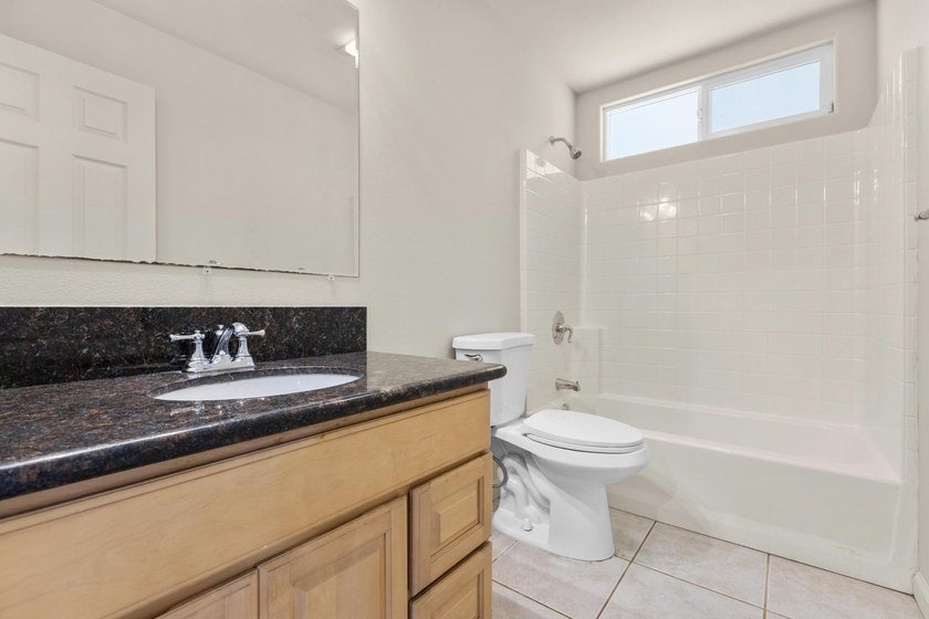 Nestled on a lush full acre of land along a quiet, paved road - photo 22
