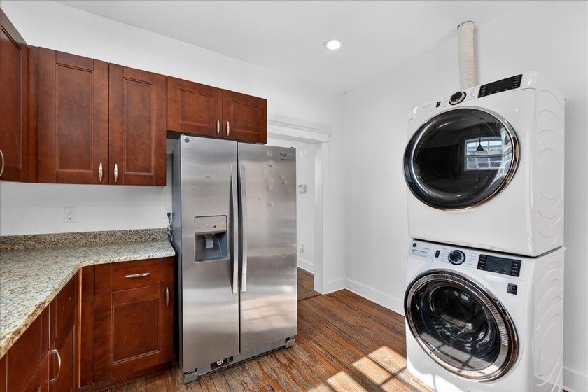 This beautifully renovated historic duplex features two units - photo 6