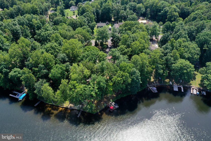 Welcome to 322 Lake Caroline Drive, where every day feels like a - photo 36