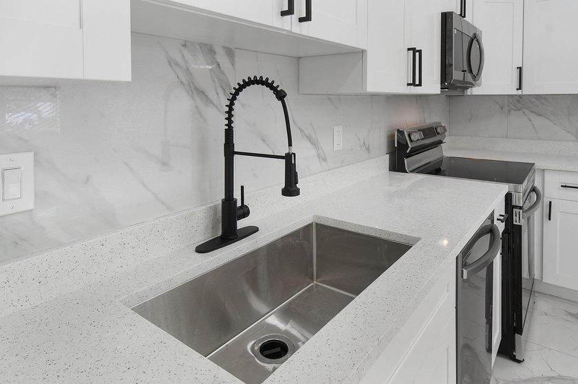 Fully renovated 3-bedroom, 2-bath home featuring a desirable - photo 12