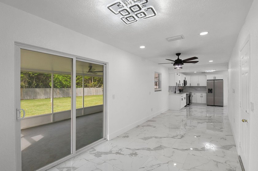 Fully renovated 3-bedroom, 2-bath home featuring a desirable - photo 17