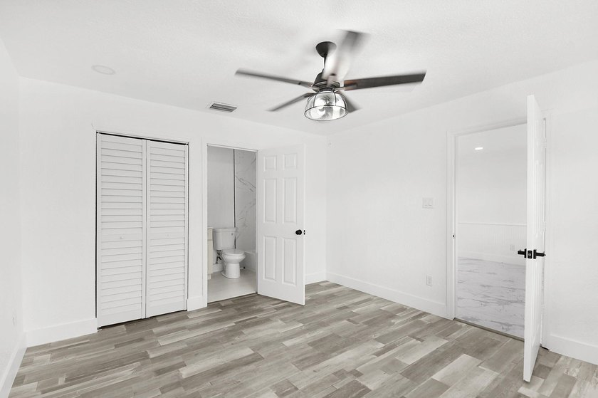 Fully renovated 3-bedroom, 2-bath home featuring a desirable - photo 18