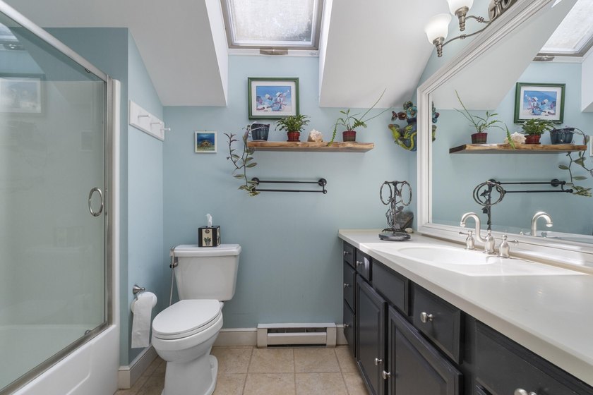 Set on a beautiful tree-lined street in Alden's Walk, this - photo 22