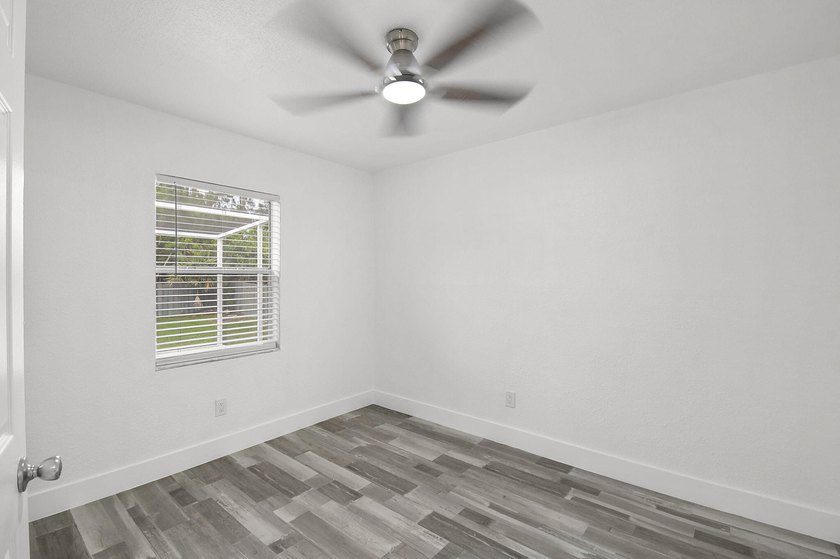 Fully renovated 3-bedroom, 2-bath home featuring a desirable - photo 22