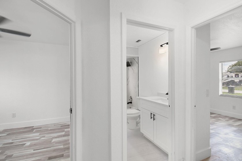 Fully renovated 3-bedroom, 2-bath home featuring a desirable - photo 23