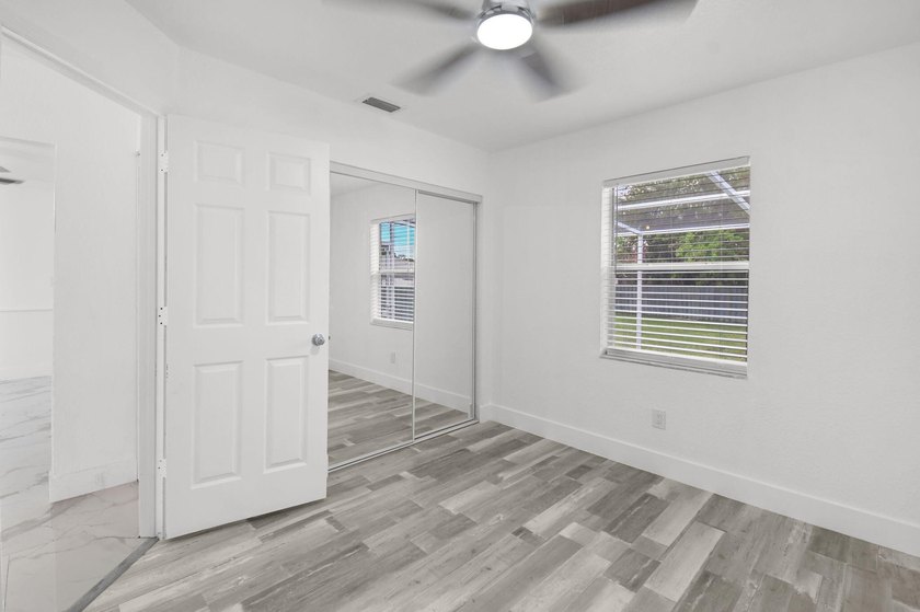 Fully renovated 3-bedroom, 2-bath home featuring a desirable - photo 27