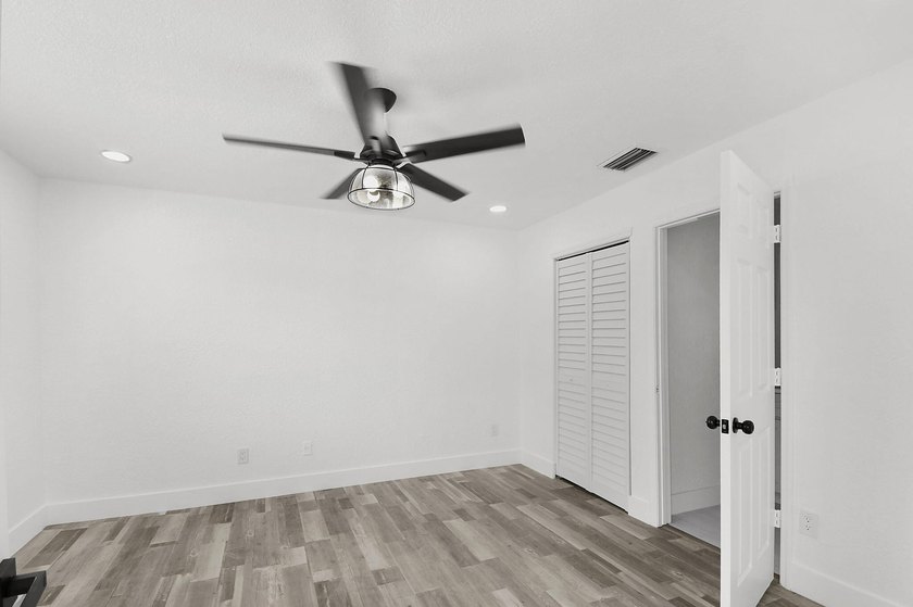 Fully renovated 3-bedroom, 2-bath home featuring a desirable - photo 28