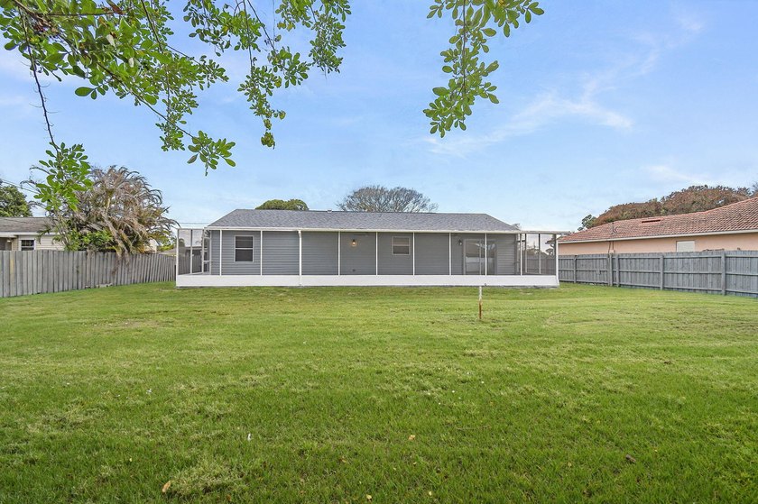 Fully renovated 3-bedroom, 2-bath home featuring a desirable - photo 37